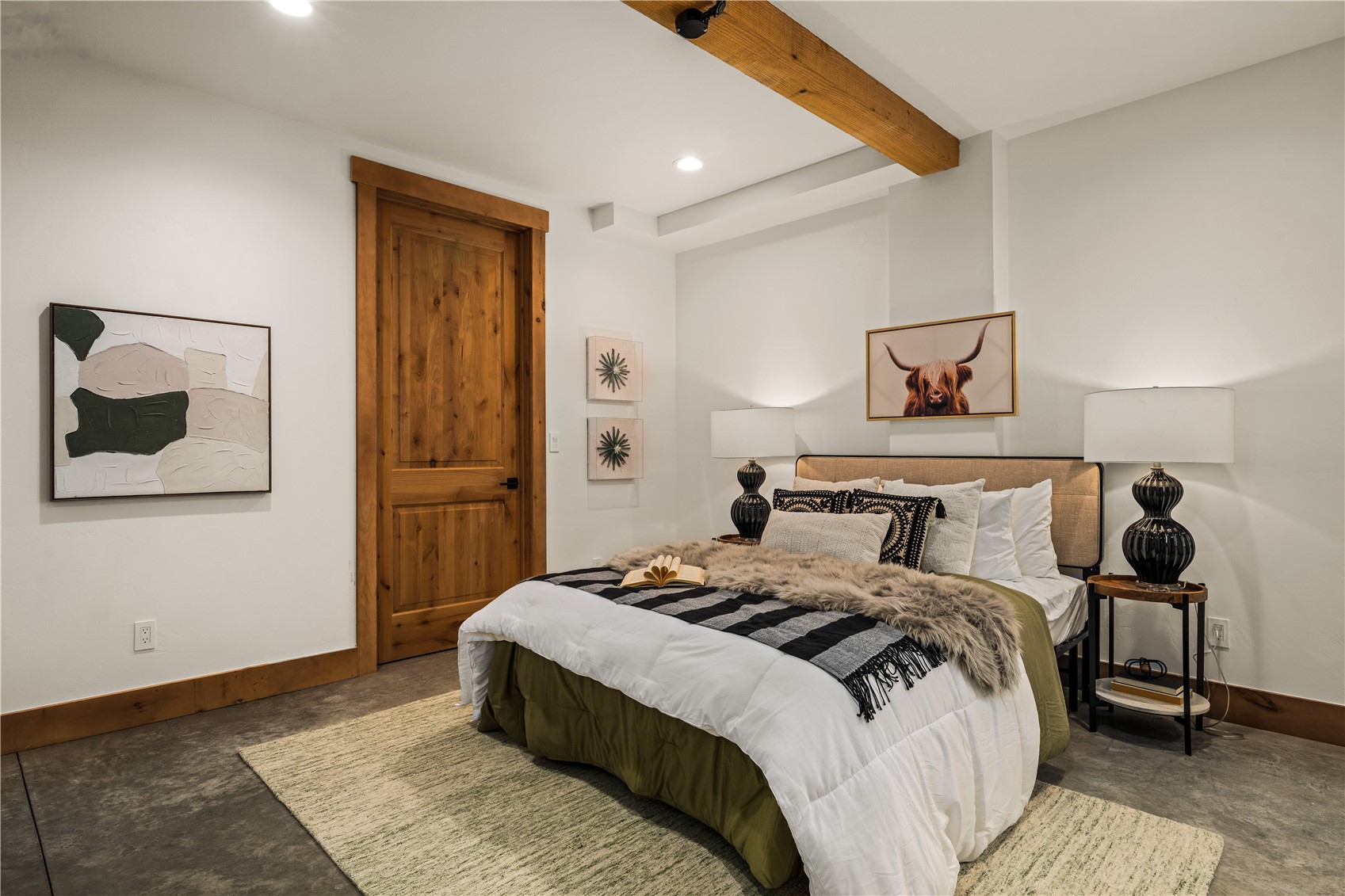 200 Sundance Court, Unit 1 Steamboat Springs, CO 80487 - Photo 32 of 50 Bedroom with beamed ceiling and recessed lighting