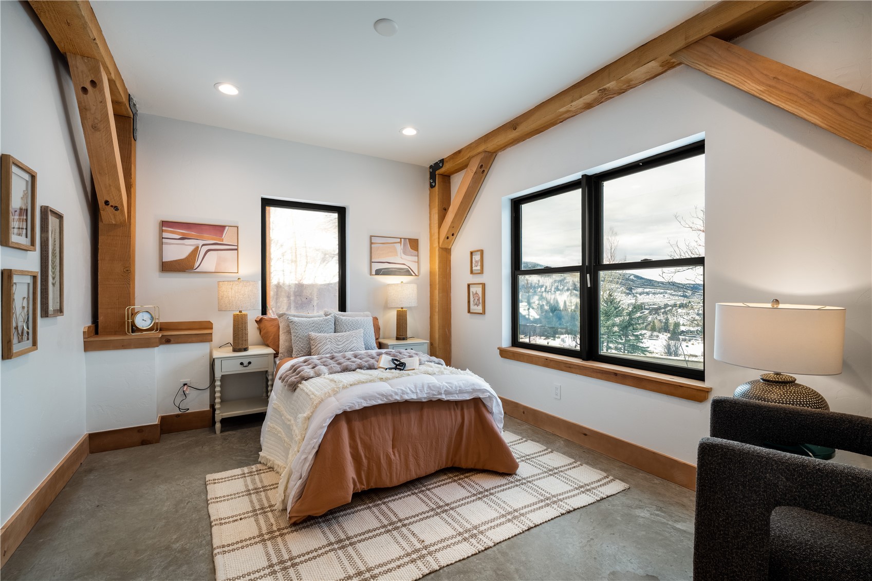 200 Sundance Court, Unit 1 Steamboat Springs, CO 80487 - Photo 34 of 50 Bedroom with multiple windows, concrete flooring, and recessed lighting