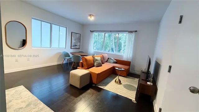 a bed room with a bed furniture and a window