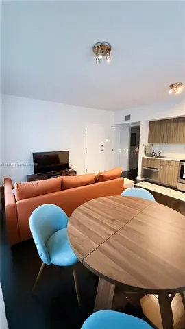 a bedroom with furniture and a couch