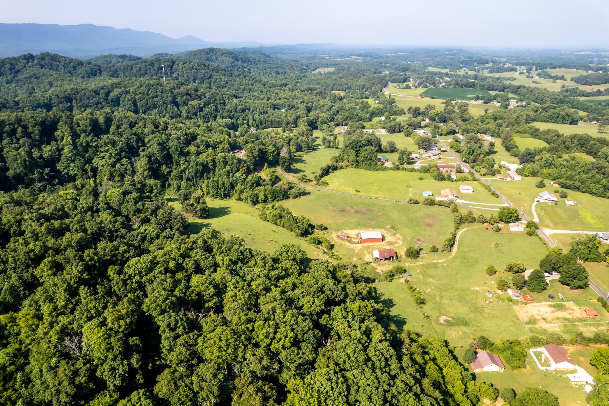 4 Blockhouse Road Maryville, TN 37803 - Photo 17 of 21 a view of a city with lush green forest