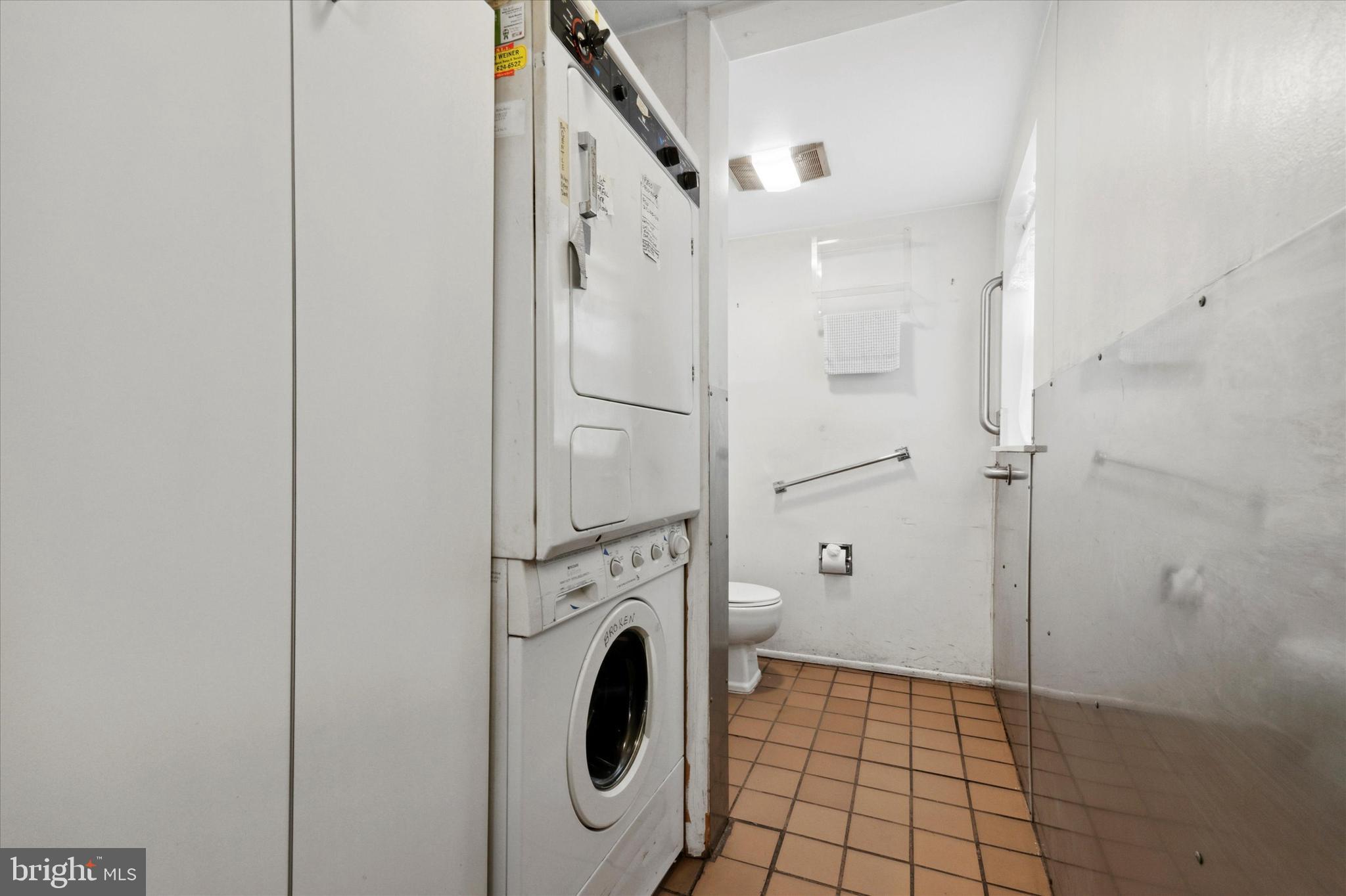 1920 Rittenhouse Square Philadelphia, PA 19103 - Photo 18 of 26 Laundry off kitchen with 1/2 bath