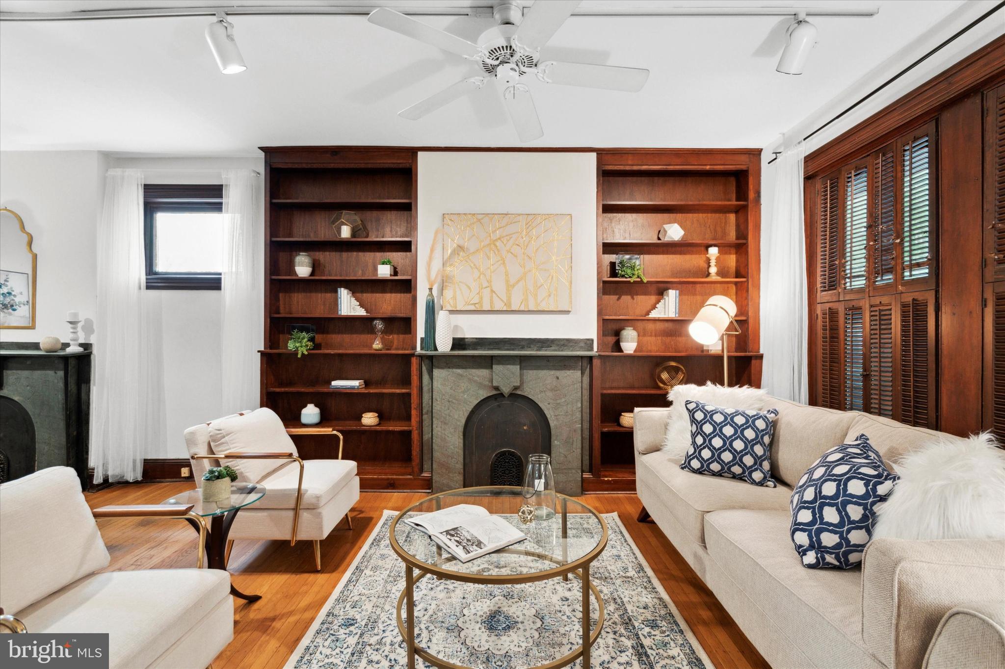1920 Rittenhouse Square Philadelphia, PA 19103 - Photo 3 of 26 Built-in bookcases. 1 of 3 fireplaces.