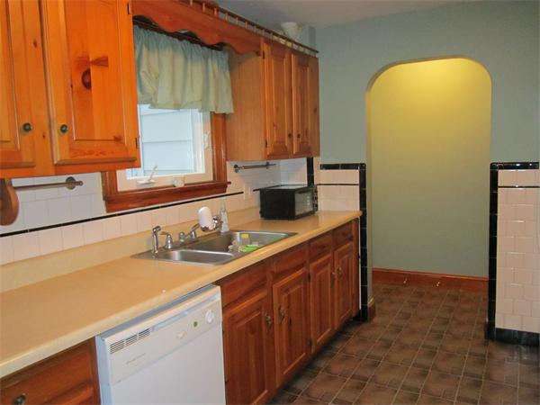 28 Martin Road Douglas, MA 01516 - Photo 14 of 28 a kitchen with a sink and a refrigerator