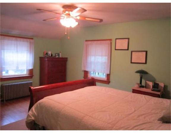 28 Martin Road Douglas, MA 01516 - Photo 19 of 28 a bedroom with a bed and a dresser