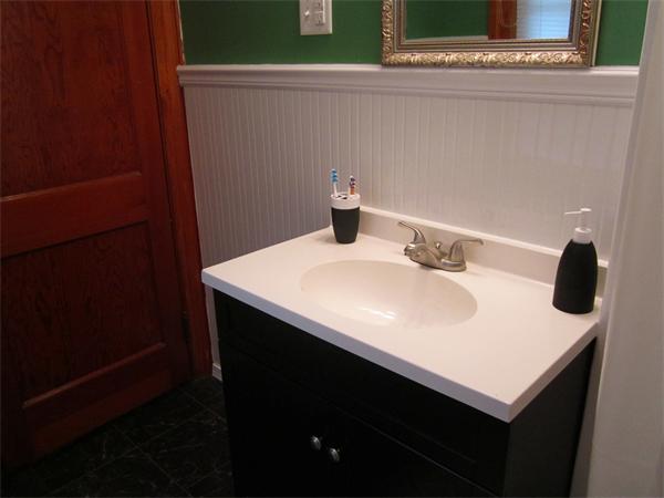 28 Martin Road Douglas, MA 01516 - Photo 23 of 28 a bathroom with a sink and a mirror
