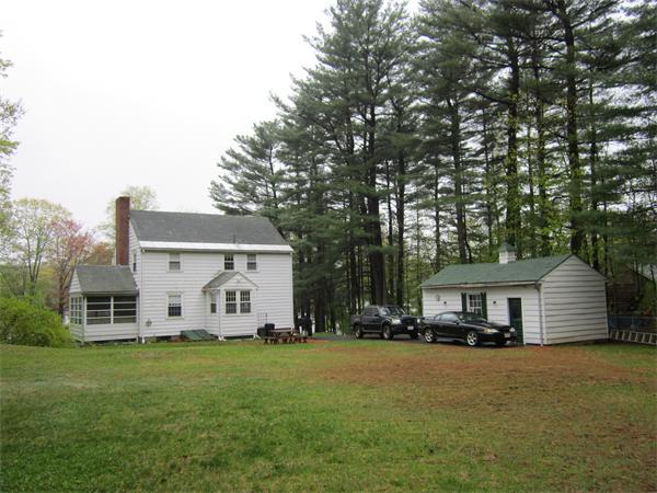 28 Martin Road Douglas, MA 01516 - Photo 26 of 28 a view of a white house with a big yard plants and large trees