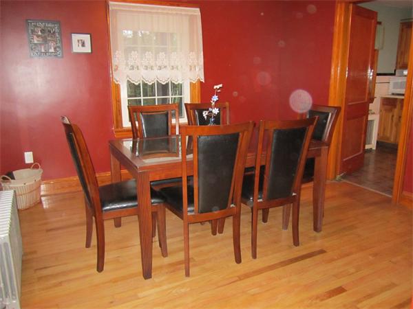 28 Martin Road Douglas, MA 01516 - Photo 9 of 28 a view of a dining room with furniture and a large window