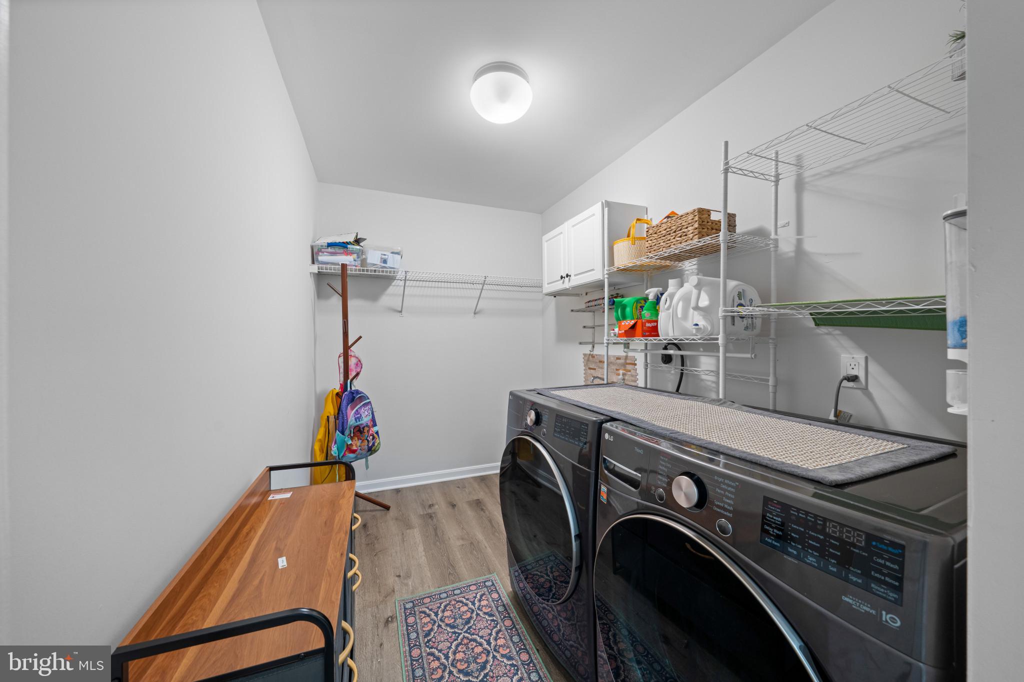 4132 Larson Lane Mount Airy, MD 21771 - Photo 13 of 36 a view of storage and utility room with washer and dryer