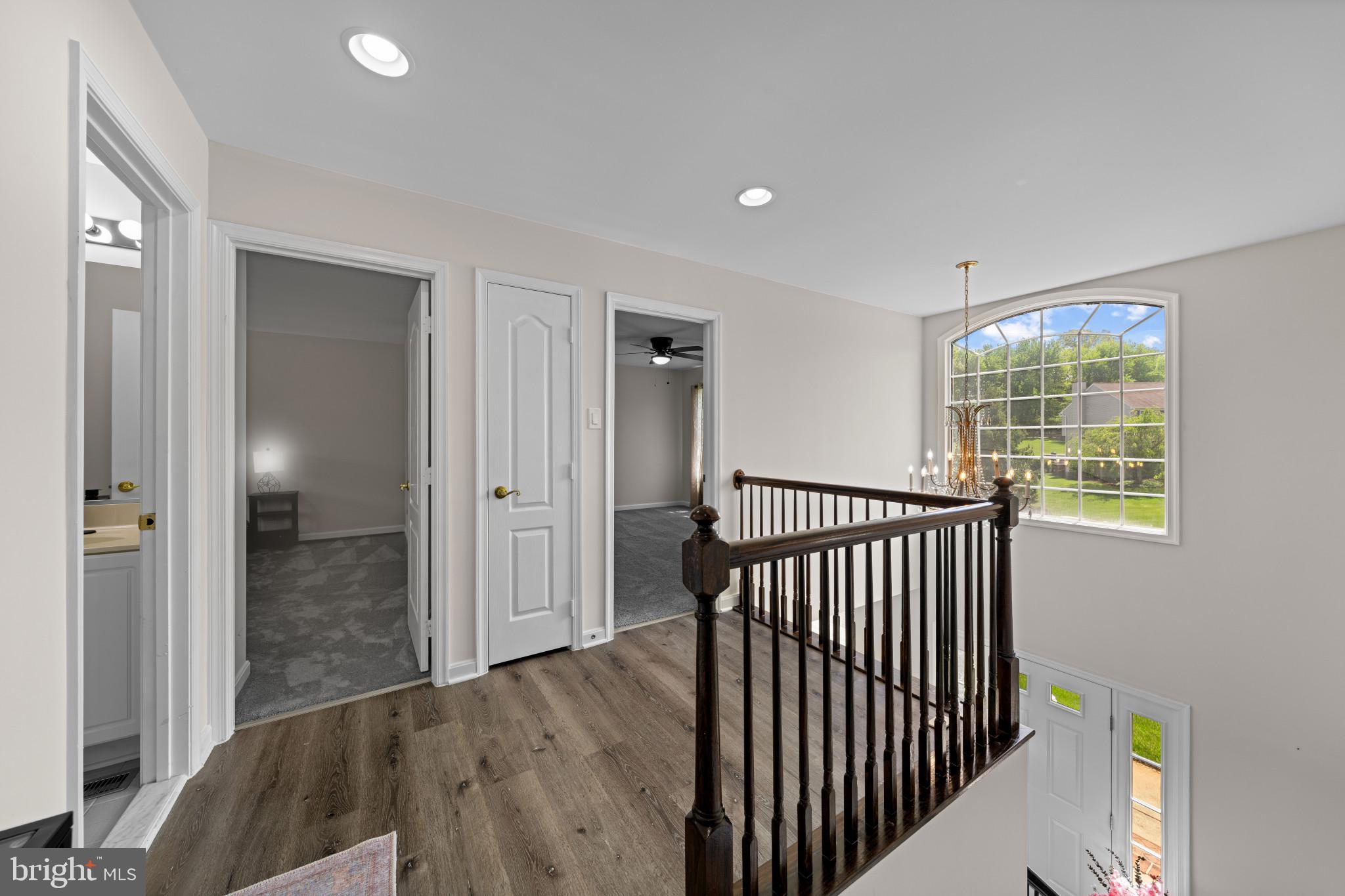 4132 Larson Lane Mount Airy, MD 21771 - Photo 27 of 36 a view of a hallway with windows and stairs