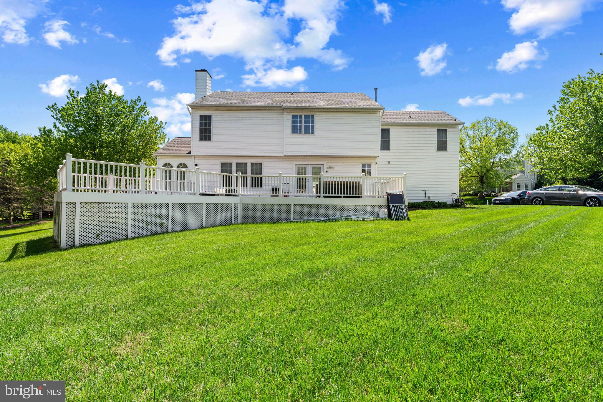 4132 Larson Lane Mount Airy, MD 21771 - Photo 35 of 36 a view of a house with a backyard and a patio