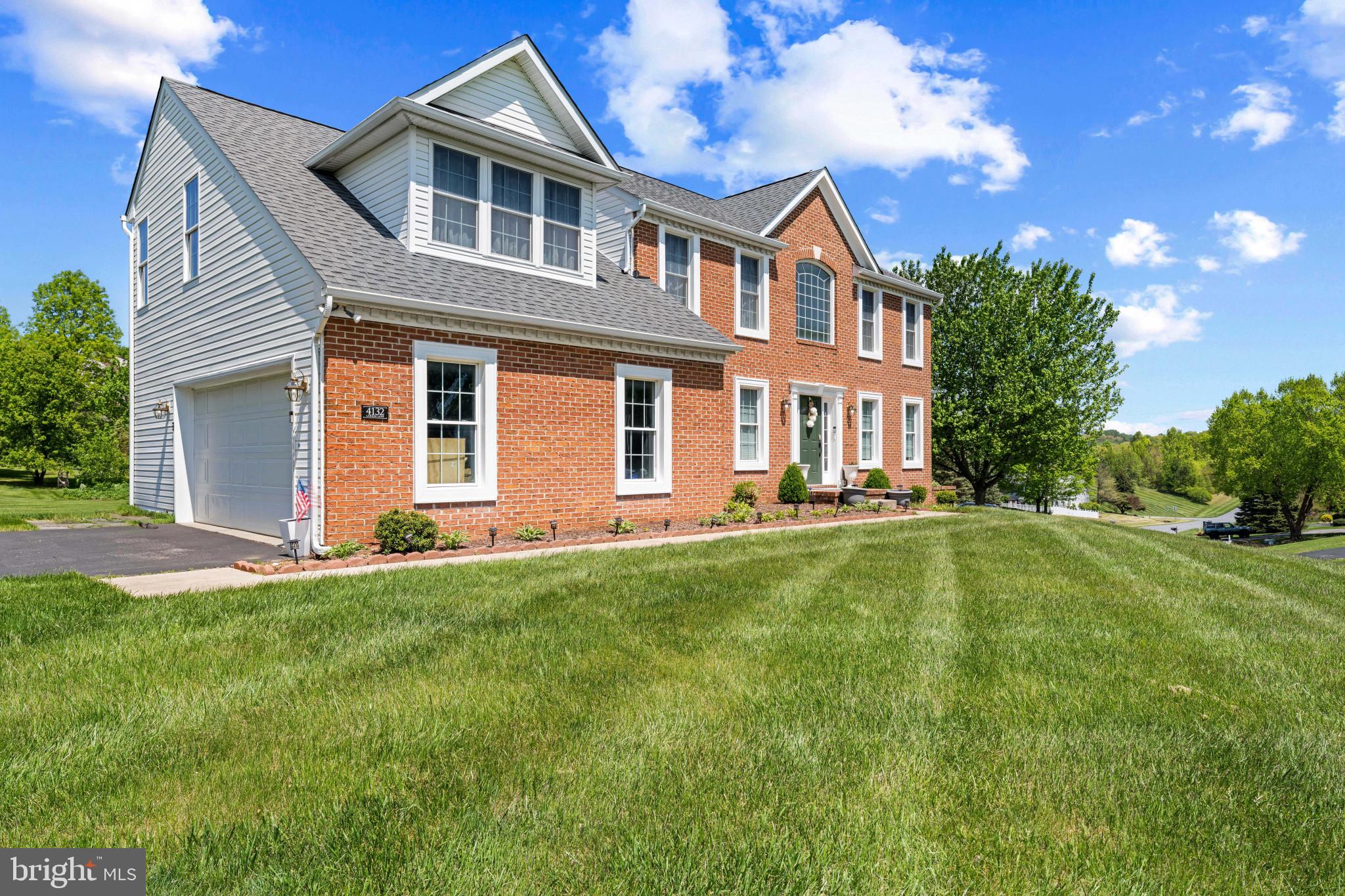 4132 Larson Lane Mount Airy, MD 21771 - Photo 4 of 40 Charming brick home on lush green lawn.