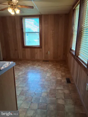 a view of an empty room with empty shelves