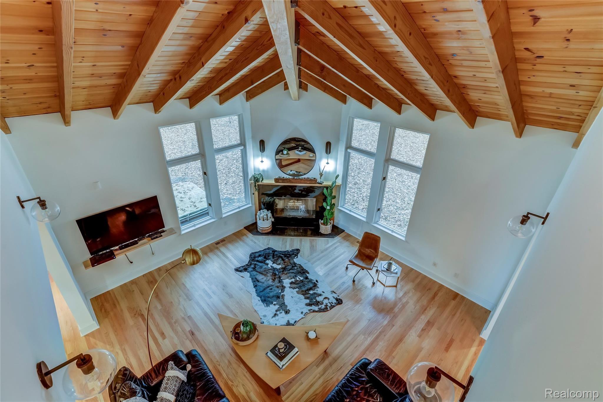Cathedral ceilings in the great room with gas fireplace.
