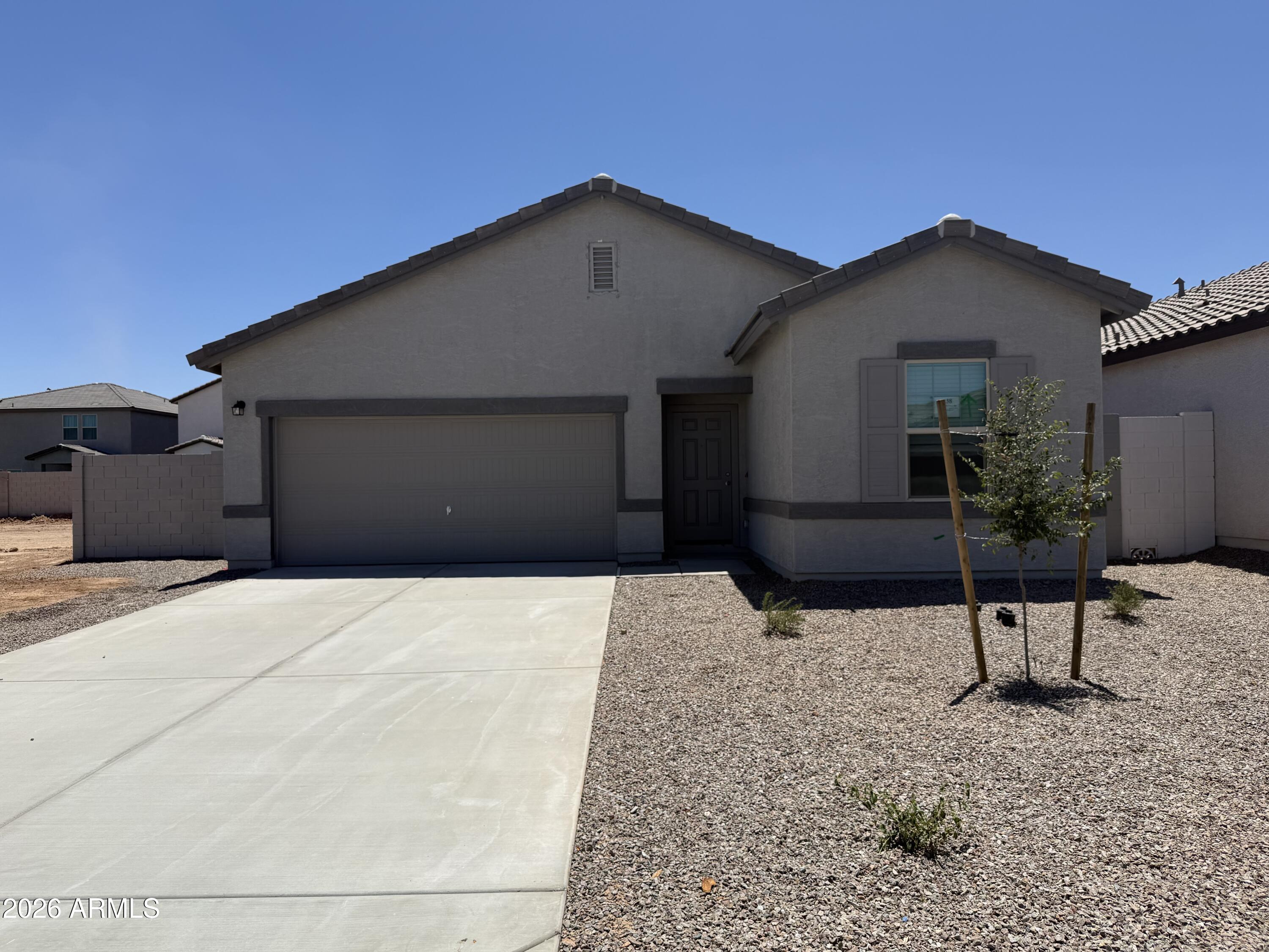 47235 West Old Timer Road Maricopa, AZ 85139 - Photo 1 of 23 a backyard of a house with seating space