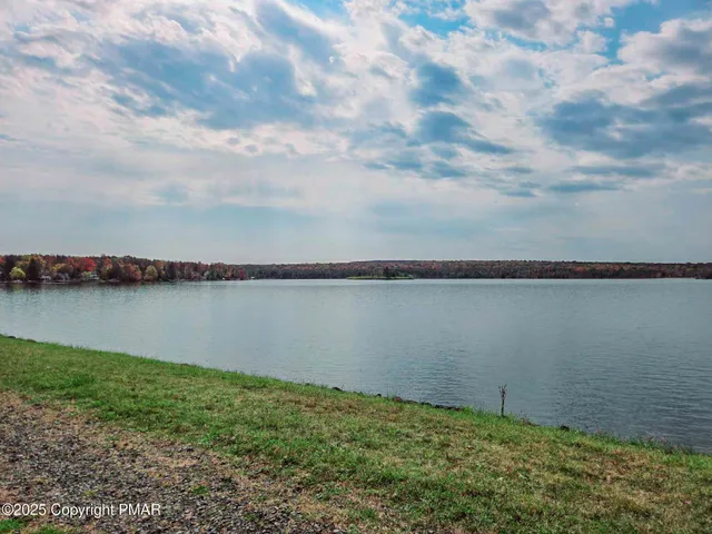 a view of a lake from a yard