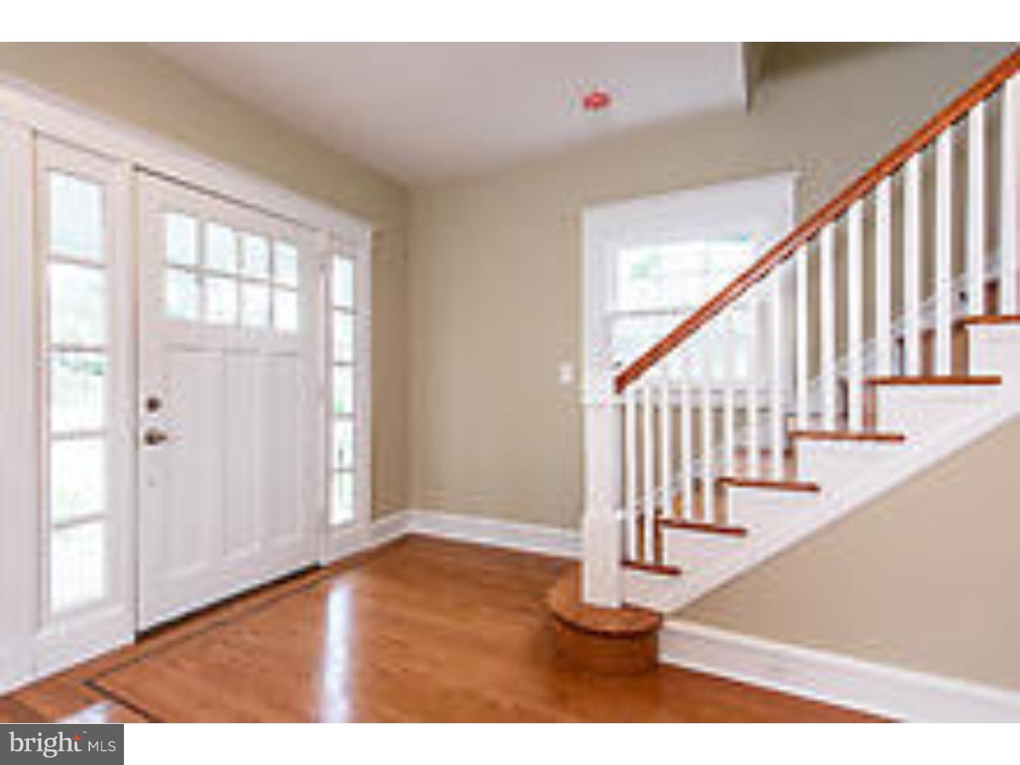 131 South Rolling Road Springfield, PA 19064 - Photo 2 of 25 a view of an entryway with wooden floor