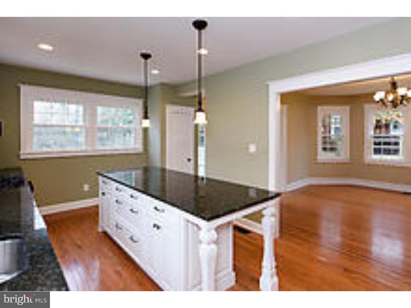 131 South Rolling Road Springfield, PA 19064 - Photo 13 of 25 a kitchen with stainless steel appliances granite countertop a sink a oven a counter space and cabinets
