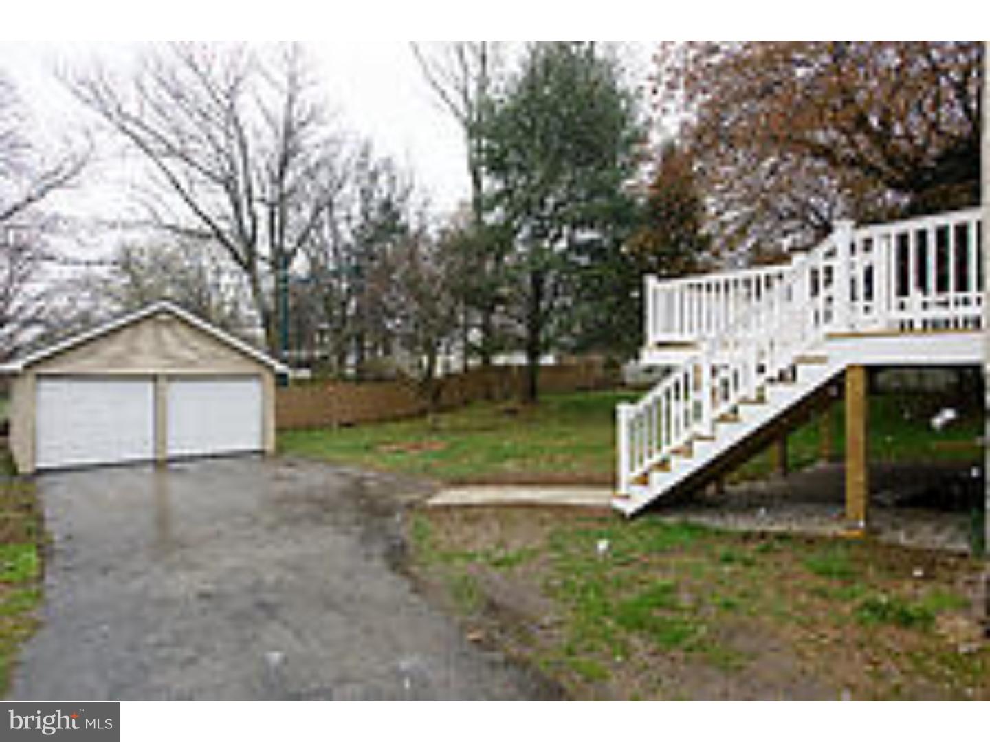 131 South Rolling Road Springfield, PA 19064 - Photo 24 of 25 a view of a house with yard and a tree