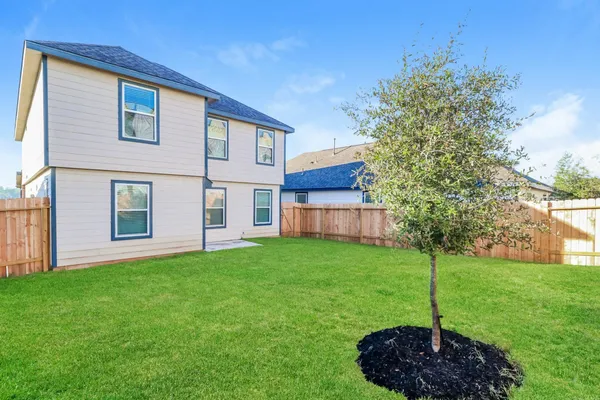 a house view with a garden space