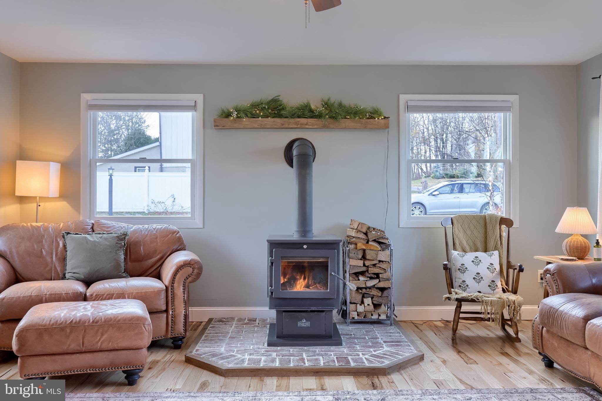770 Mohns Hill Road Reading, PA 19608 - Photo 11 of 53 a living room with furniture a window and a fireplace