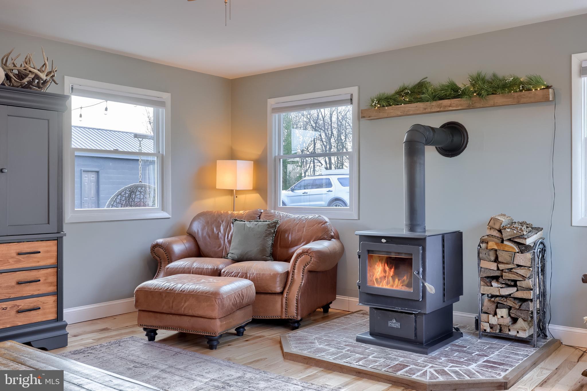 770 Mohns Hill Road Reading, PA 19608 - Photo 12 of 53 a living room with furniture and a fireplace
