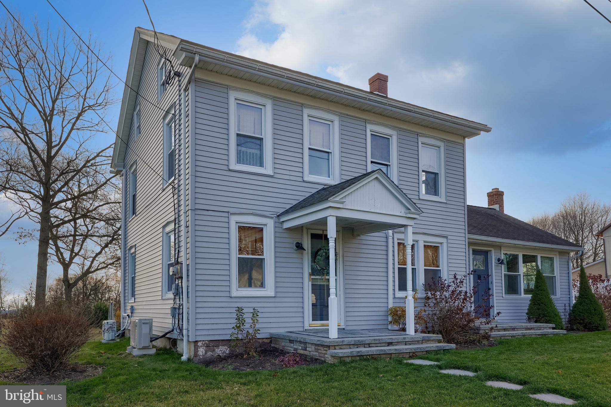 770 Mohns Hill Road Reading, PA 19608 - Photo 2 of 53 a front view of a house with a yard