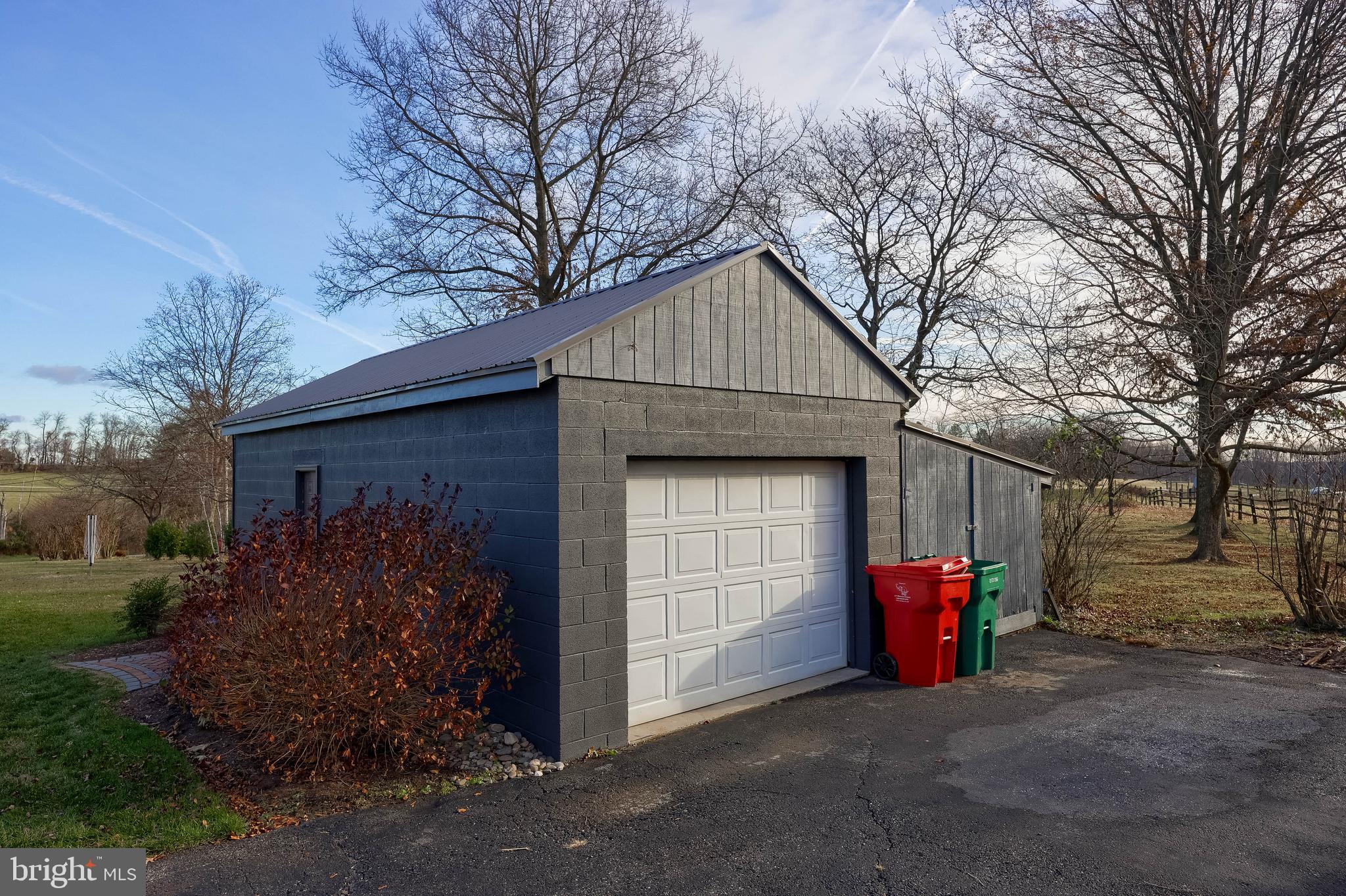 770 Mohns Hill Road Reading, PA 19608 - Photo 52 of 53 a front view of a house with a yard and garage