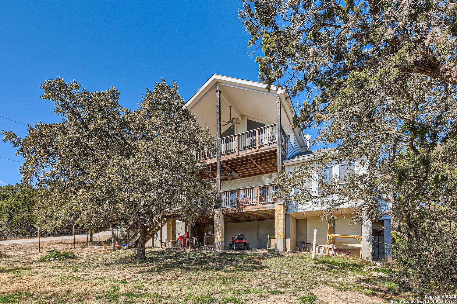 a view of a large building with large tree
