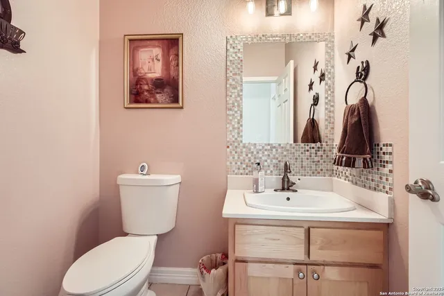 a bedroom with a bed wooden floor and window