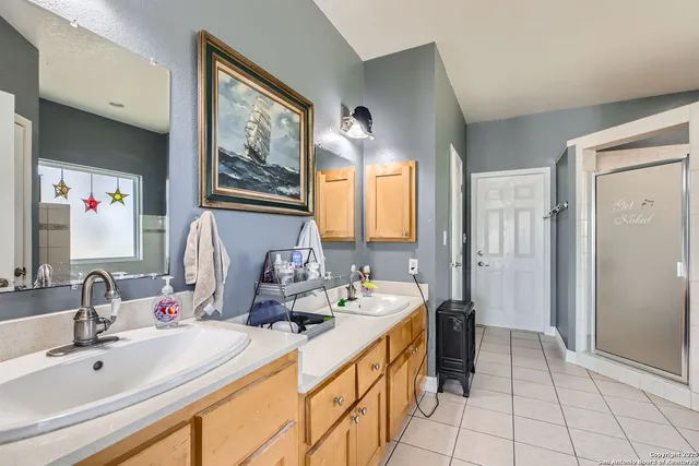 a bathroom with a tub and a shower