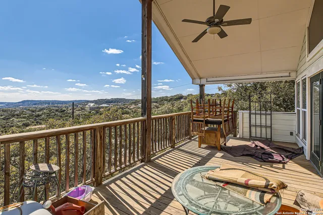 a view of balcony with furniture
