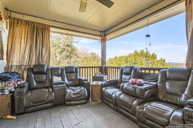 a view of a swimming pool with a patio