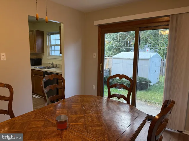 a bedroom with a bed and a table