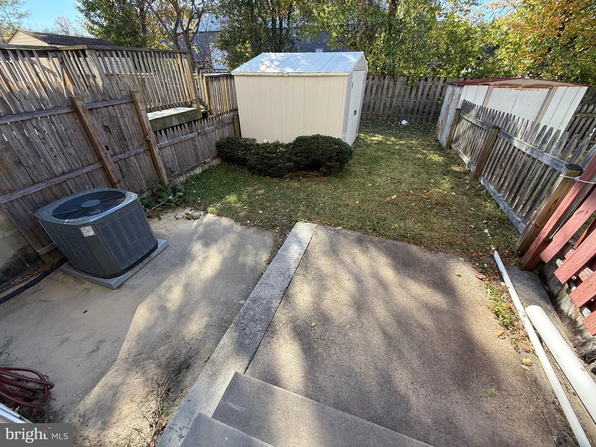 34 King Charles Circle, Unit 34 Rosedale, MD 21237 - Photo 23 of 25 a view of a backyard with furniture