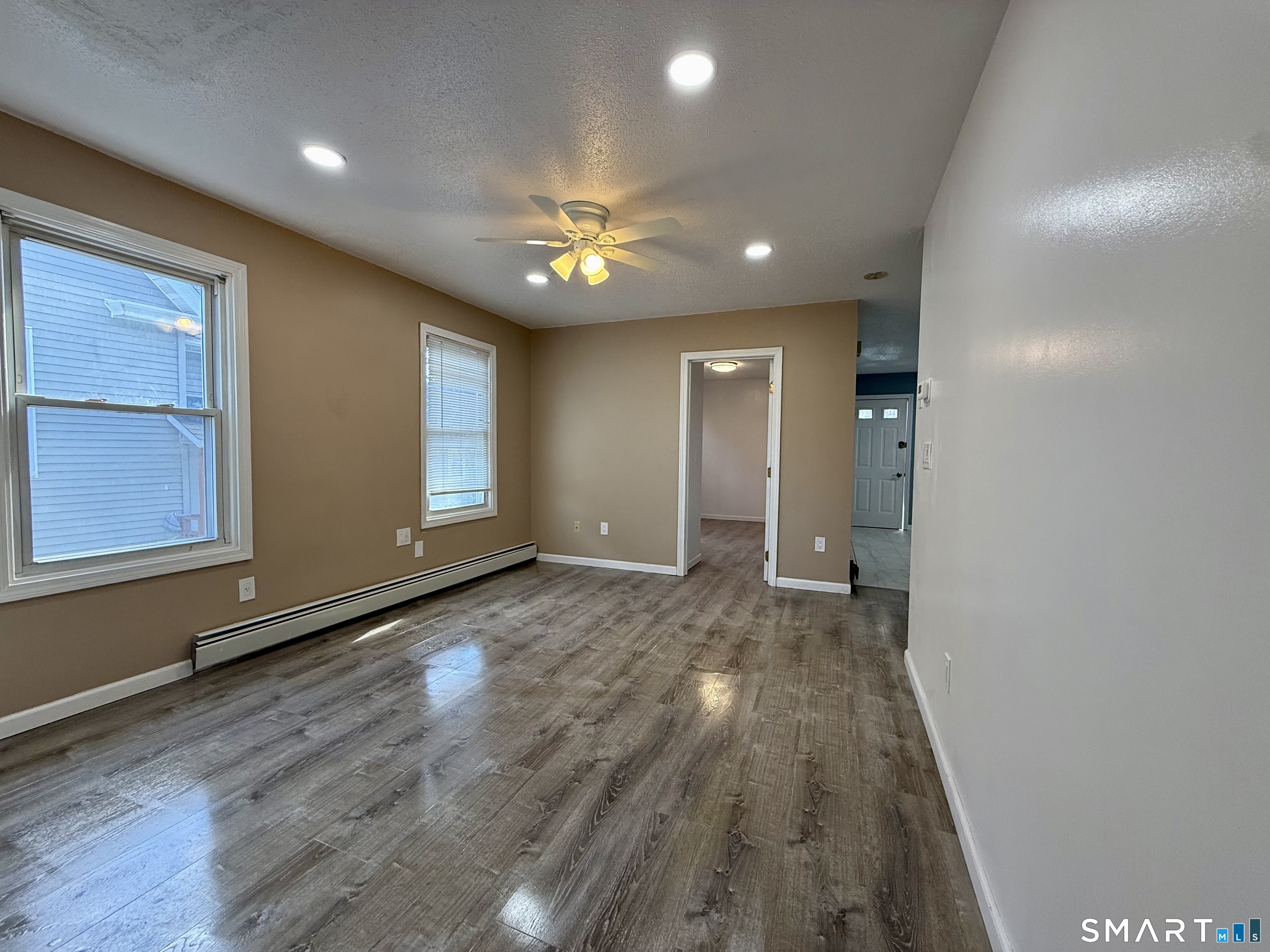 8 Scott Street, Unit 2 Naugatuck, CT 06770 - Photo 6 of 15 a view of empty room with wooden floor