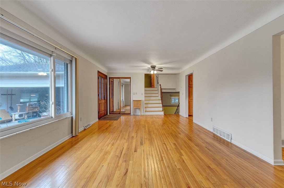 2990 Hampton Road Cleveland, OH 44120 - Photo 6 of 29 Unfurnished living room with light wood-style flooring and ceiling fan