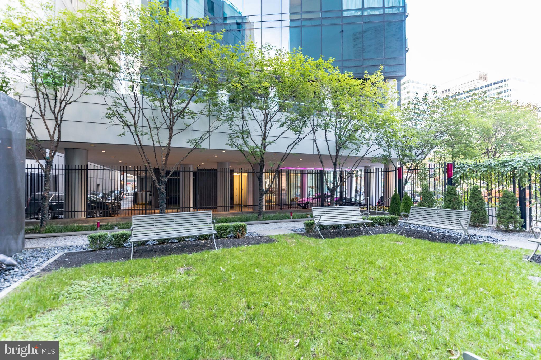 1414 South Penn Square, Unit 32F Philadelphia, PA 19102 - Photo 29 of 35 a house view with a sitting space and garden