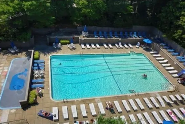a view of a backyard with sitting area