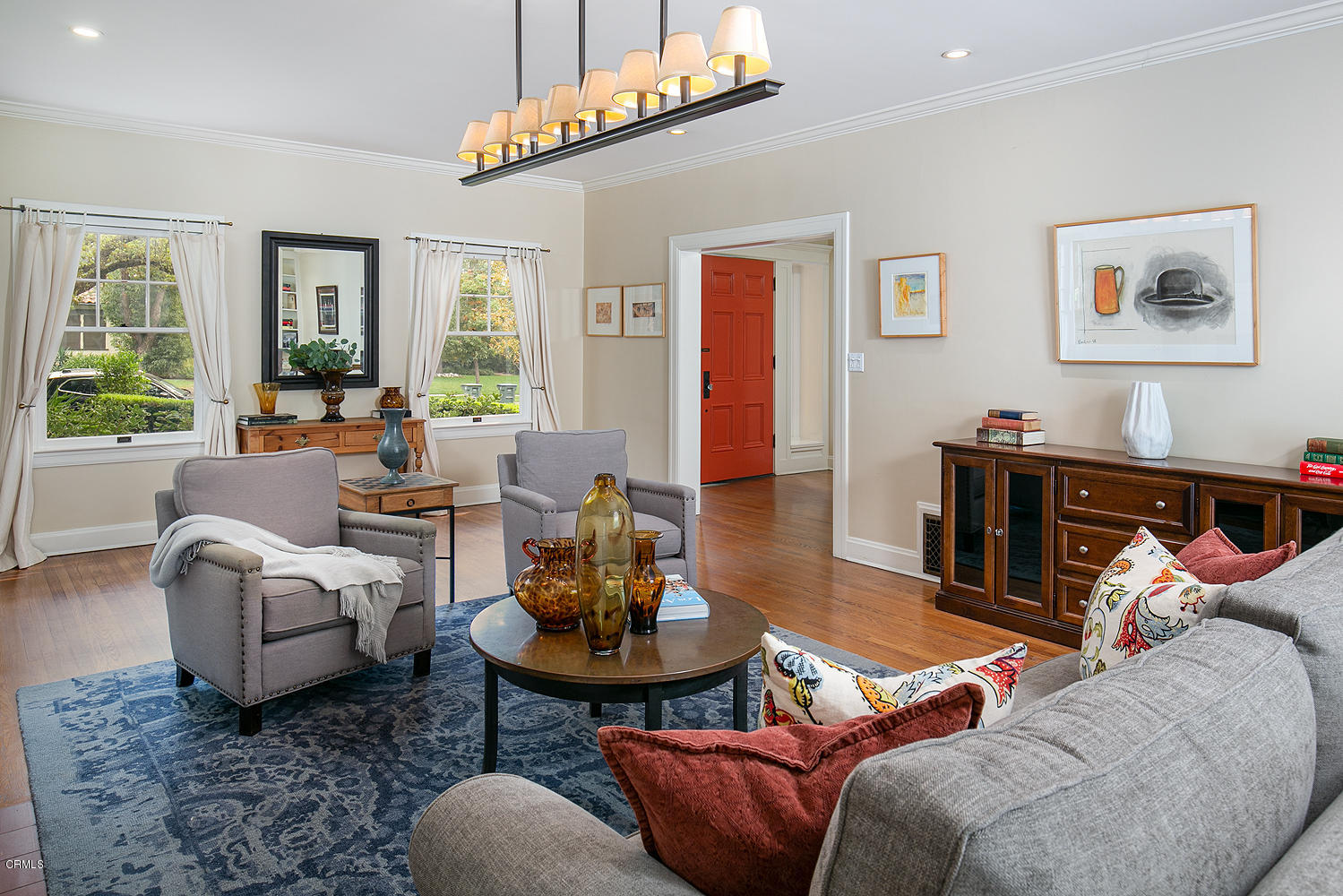 1041 Prospect Boulevard Pasadena, CA 91103 - Photo 11 of 47 a living room with furniture chandelier and a large window