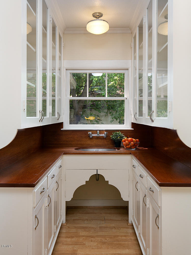 1041 Prospect Boulevard Pasadena, CA 91103 - Photo 16 of 47 a kitchen with a sink and a window