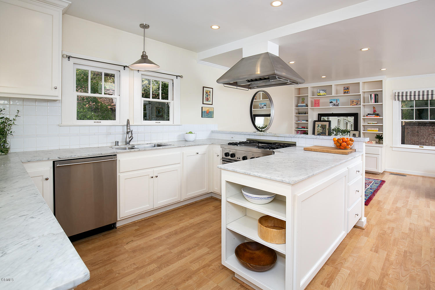 1041 Prospect Boulevard Pasadena, CA 91103 - Photo 18 of 47 a kitchen that has a sink a stove and wooden floor