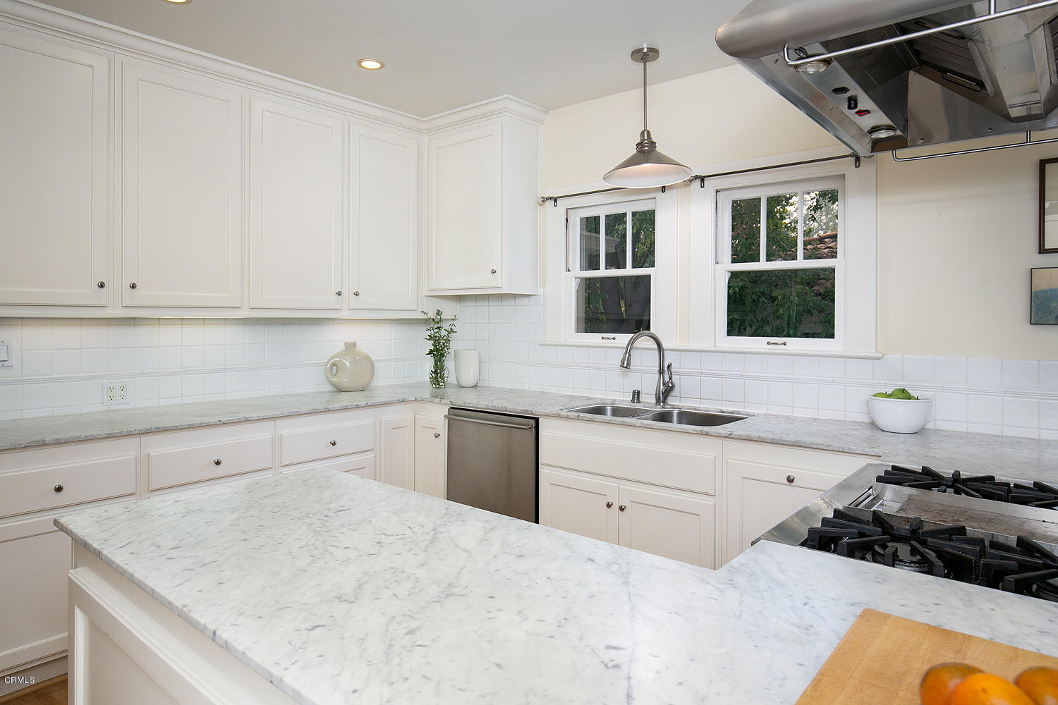 1041 Prospect Boulevard Pasadena, CA 91103 - Photo 19 of 47 a kitchen with granite countertop white cabinets and sink