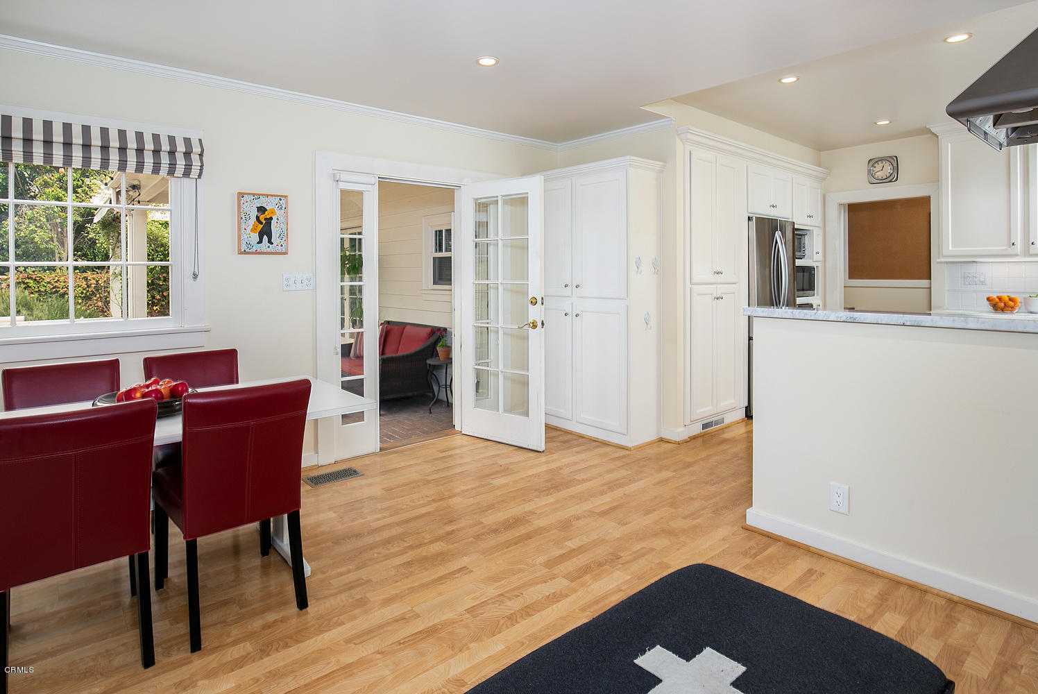 1041 Prospect Boulevard Pasadena, CA 91103 - Photo 23 of 47 a view of a dining room with furniture window and wooden floor