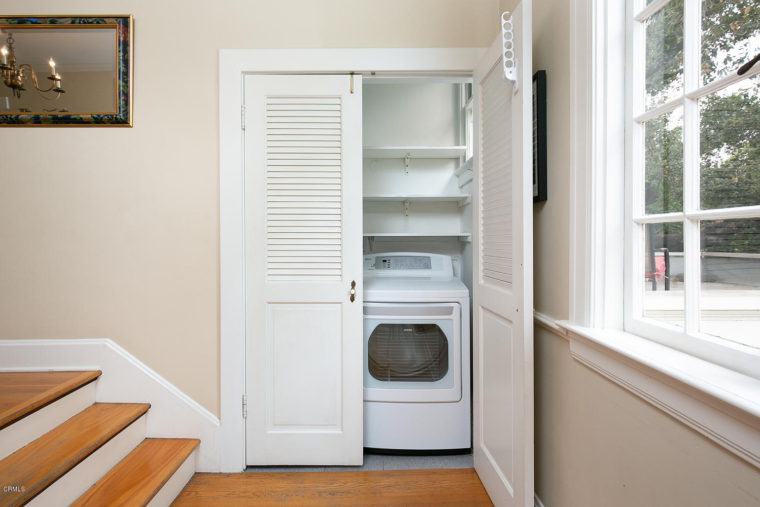1041 Prospect Boulevard Pasadena, CA 91103 - Photo 25 of 47 a utility room with washing machine and a view of bedroom