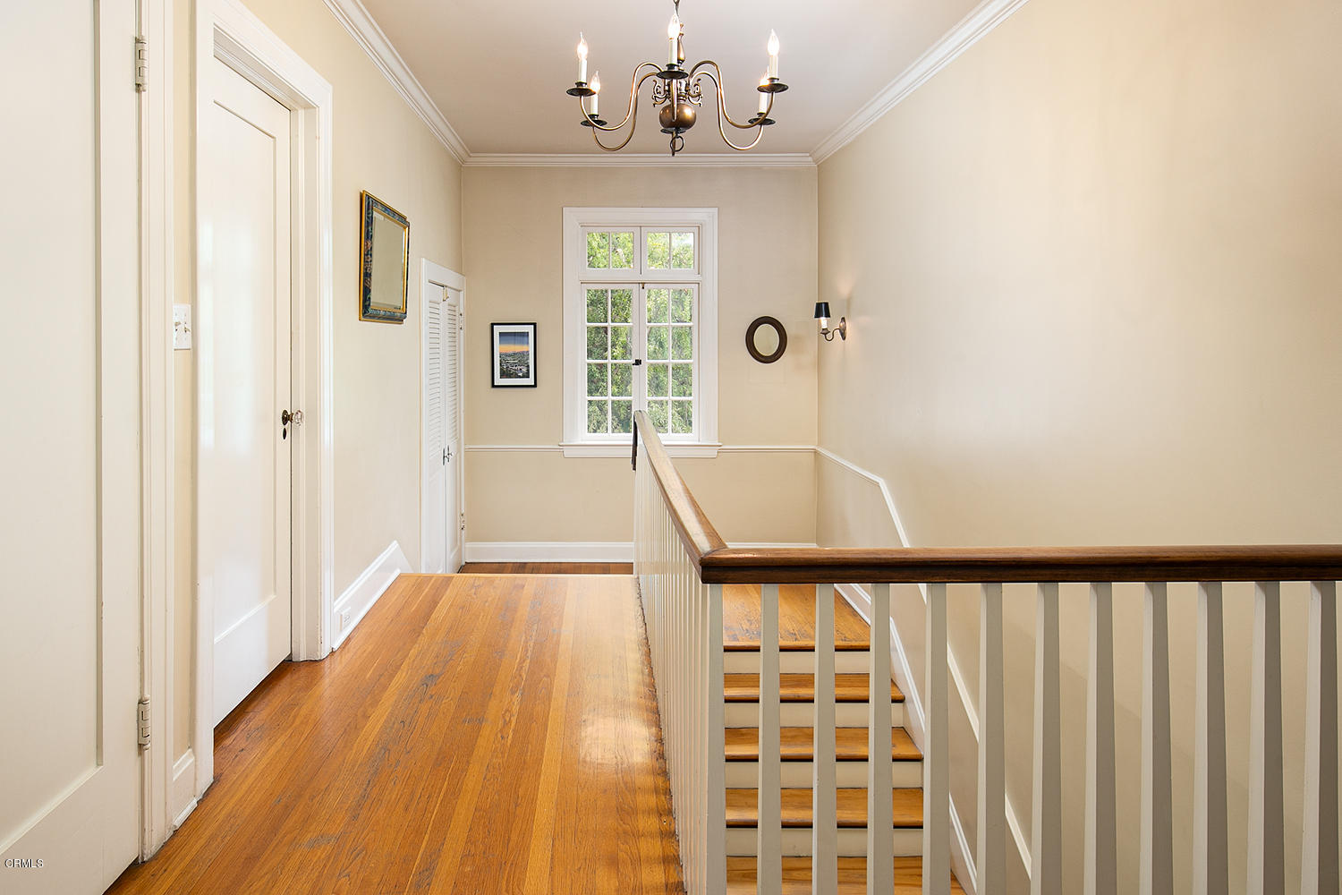1041 Prospect Boulevard Pasadena, CA 91103 - Photo 26 of 47 a view of a hallway with windows and chandelier