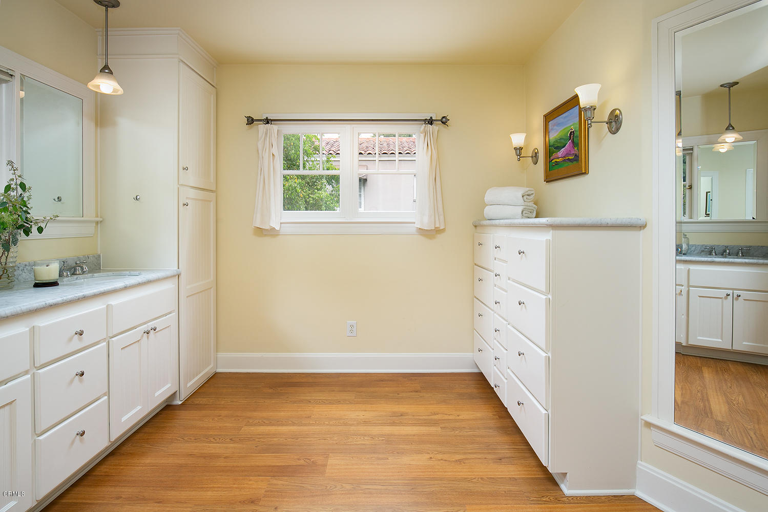 1041 Prospect Boulevard Pasadena, CA 91103 - Photo 29 of 47 a bathroom with a sink and a mirror