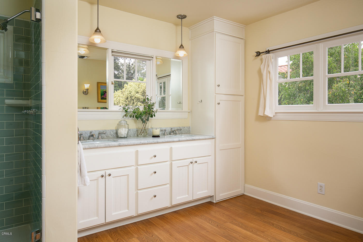 1041 Prospect Boulevard Pasadena, CA 91103 - Photo 30 of 47 a bathroom with a granite countertop sink mirror and next to a window