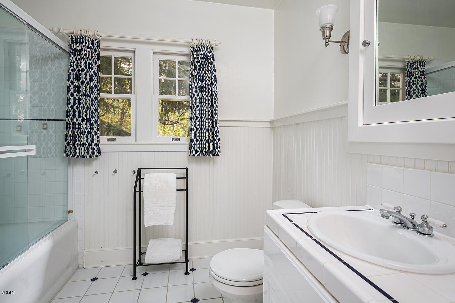 1041 Prospect Boulevard Pasadena, CA 91103 - Photo 33 of 47 a bathroom with a sink toilet and shower