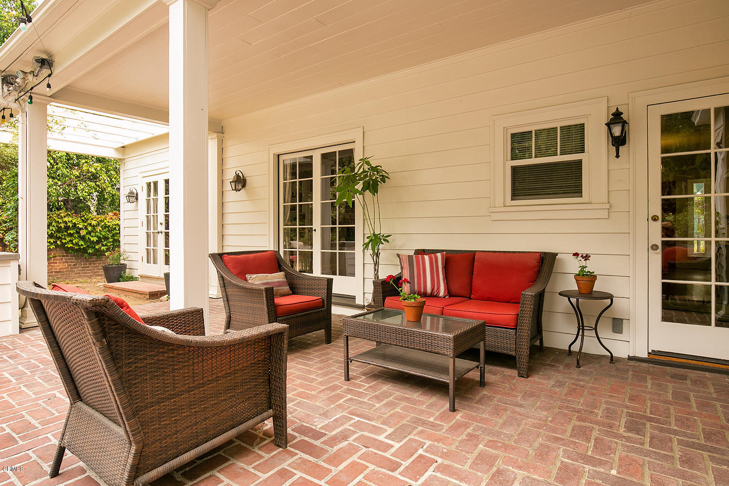 1041 Prospect Boulevard Pasadena, CA 91103 - Photo 36 of 47 a outdoor living space with patio furniture and a window